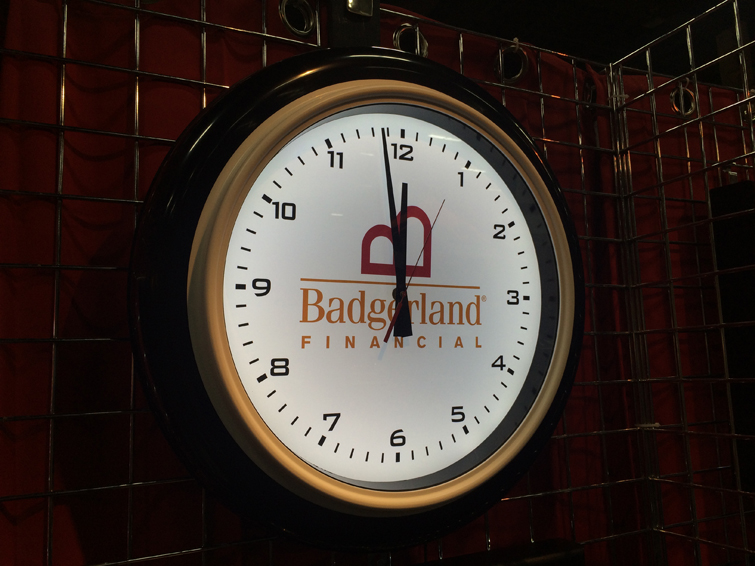 Backlit illuminated wall clock. These 22" lighted clocks have a minimum order of 10 pieces.